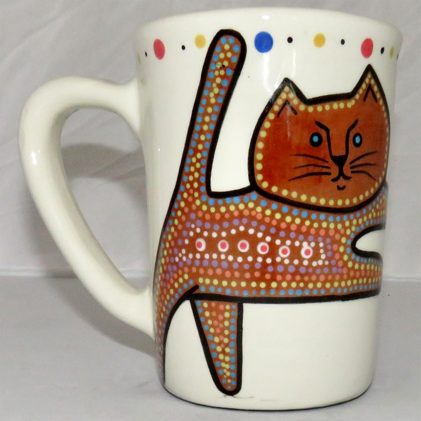 Mana Pottery large mug featuring brown kitty and desert veg on opposite sides