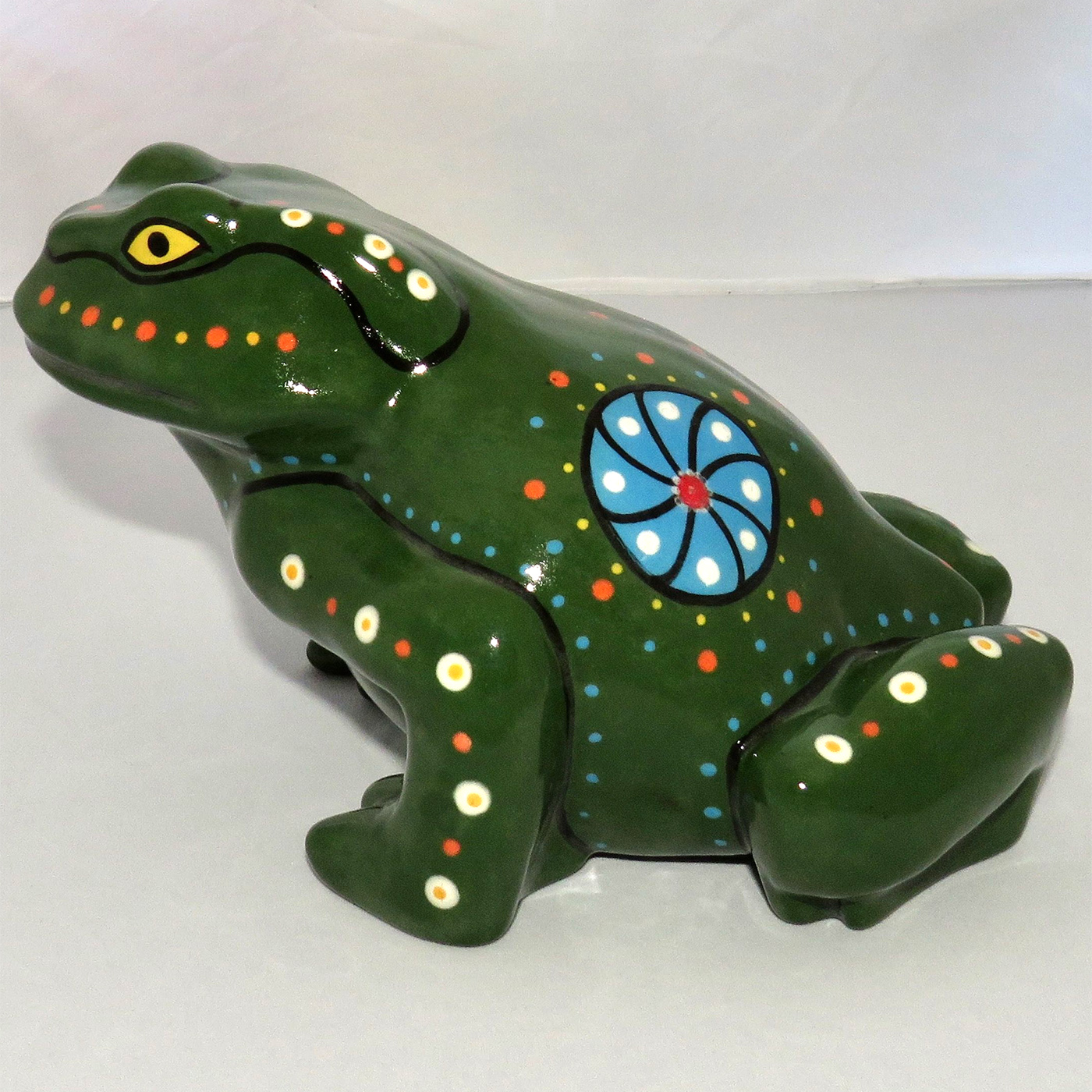 Mana Pottery Toad statue. Side view.