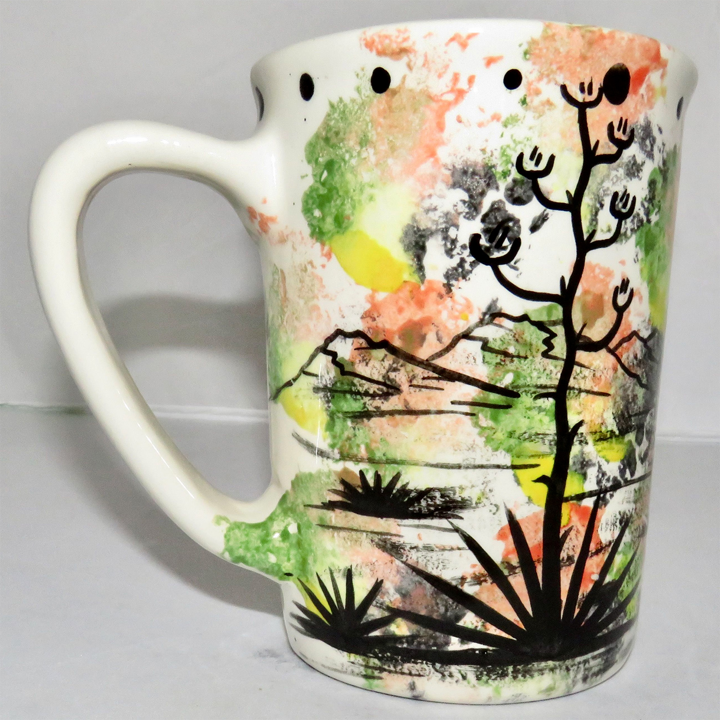 Mana Pottery large mug featuring Dancing Peyote with blue top on one side and Aravaipa desert scene on reverse