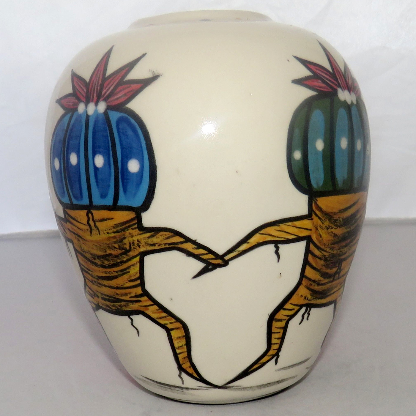 Mana Pottery 5-inch vase featuring Peyote Duo and flaming red desert, on reverse sides.