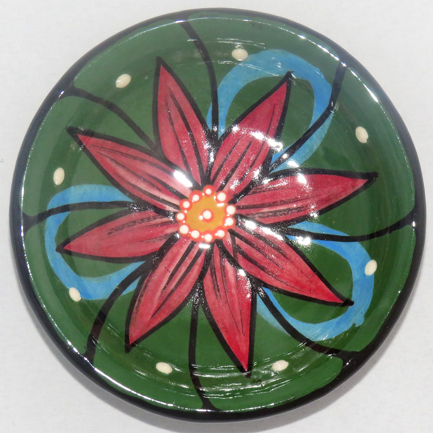 Mana Pottery Holy Bowl featuring large blooming Peyote button design, with black and white marbled underside.