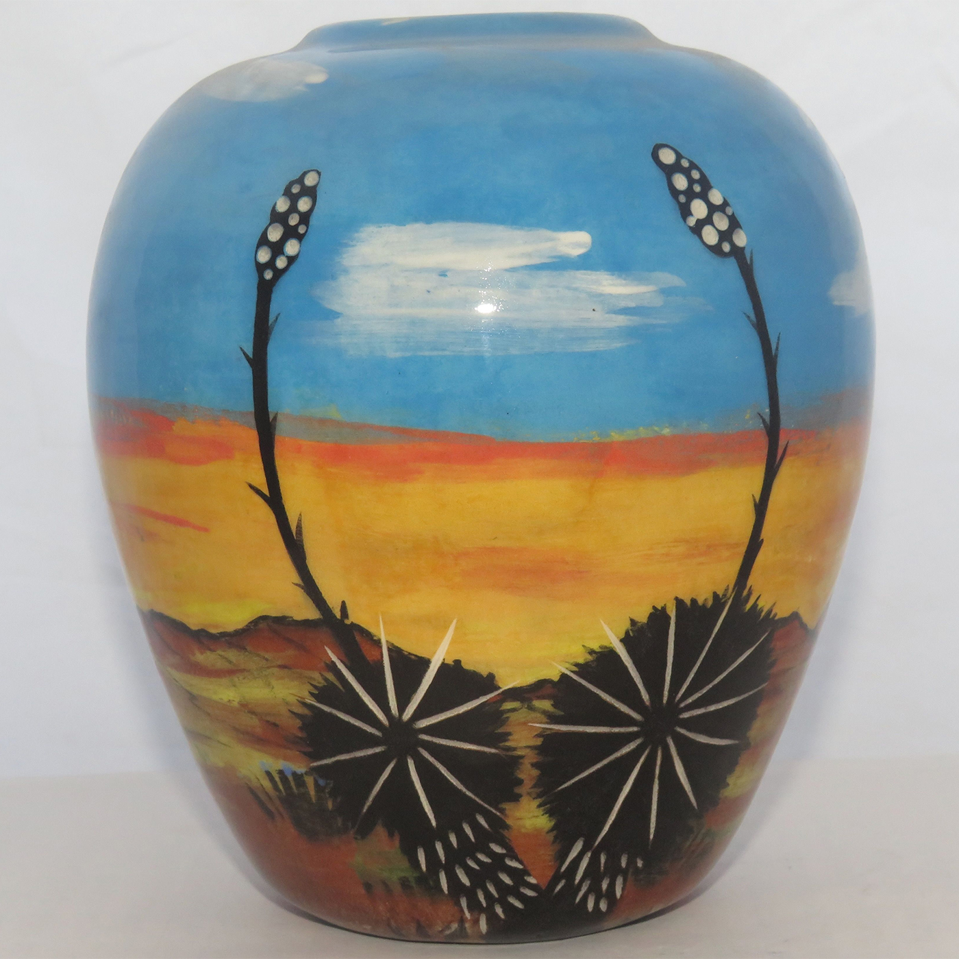 Mana Pottery Simple Five Inch Vase featuring magnificent hawk threatening fast fleeing rabbit against flaming desert dawn.