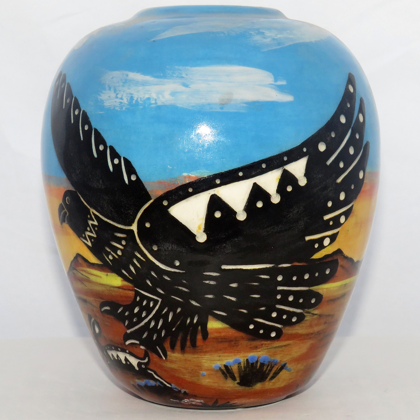 Mana Pottery Simple Five Inch Vase featuring magnificent hawk threatening fast fleeing rabbit against flaming desert dawn.