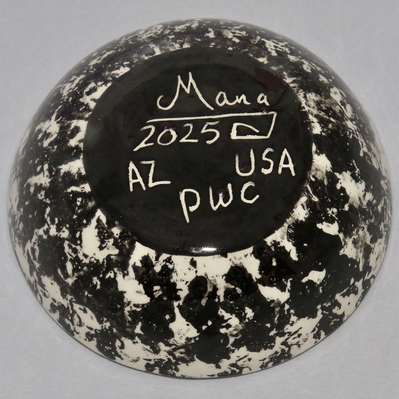 Photo of Mana Pottery Five Inch Bowl featuring Dancing Peyote. This view shows the marbled underside.