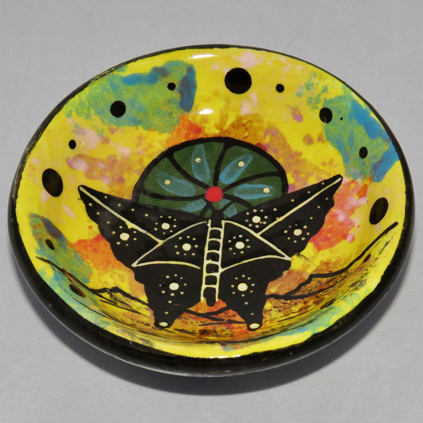 Photo of Mana Pottery Holy Bowl featuring butterfly on Peyote button.