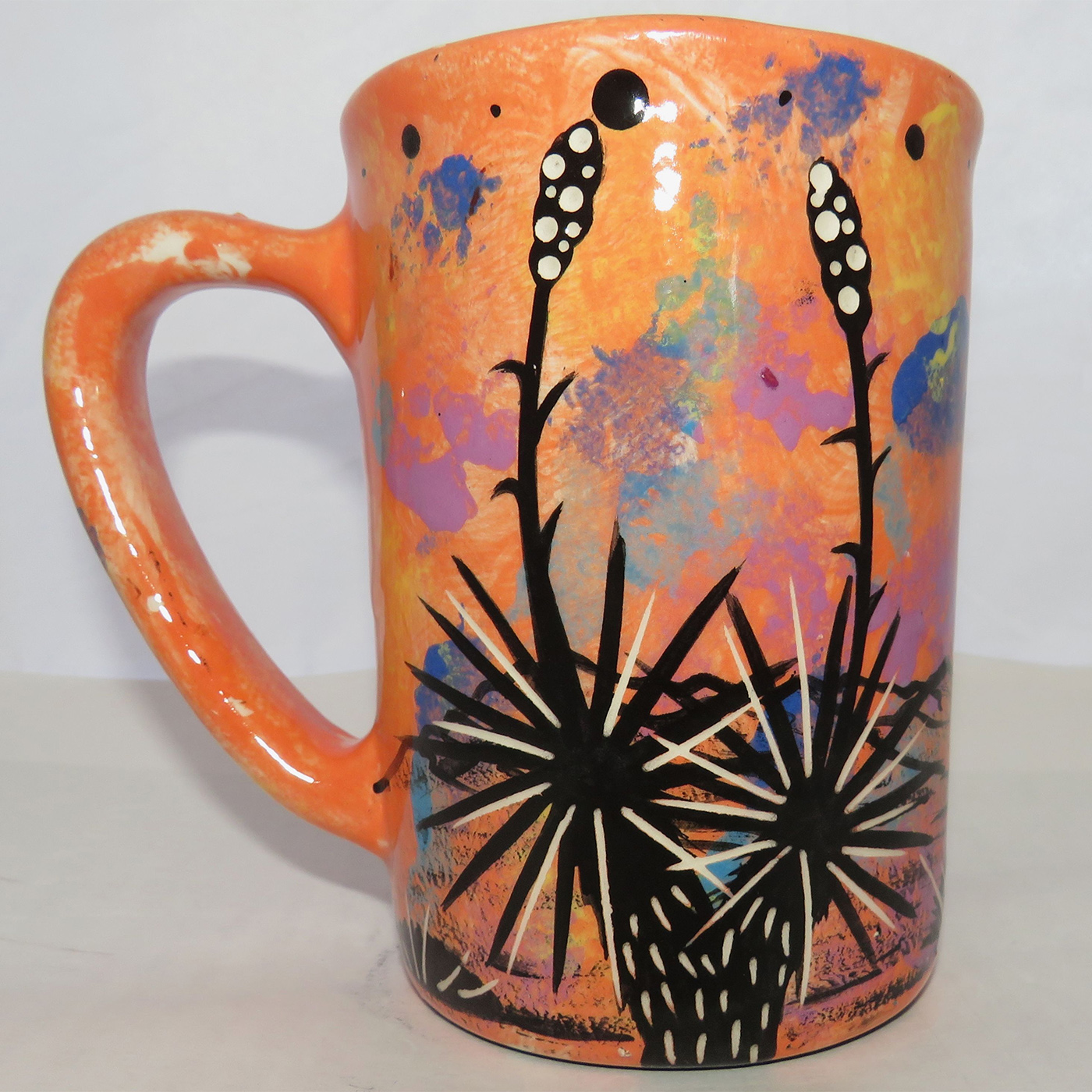 Mana Pottery Large Mug featuring a Spirit Walker praying in a brilliant desert sunrise (this view shows the reverse side).