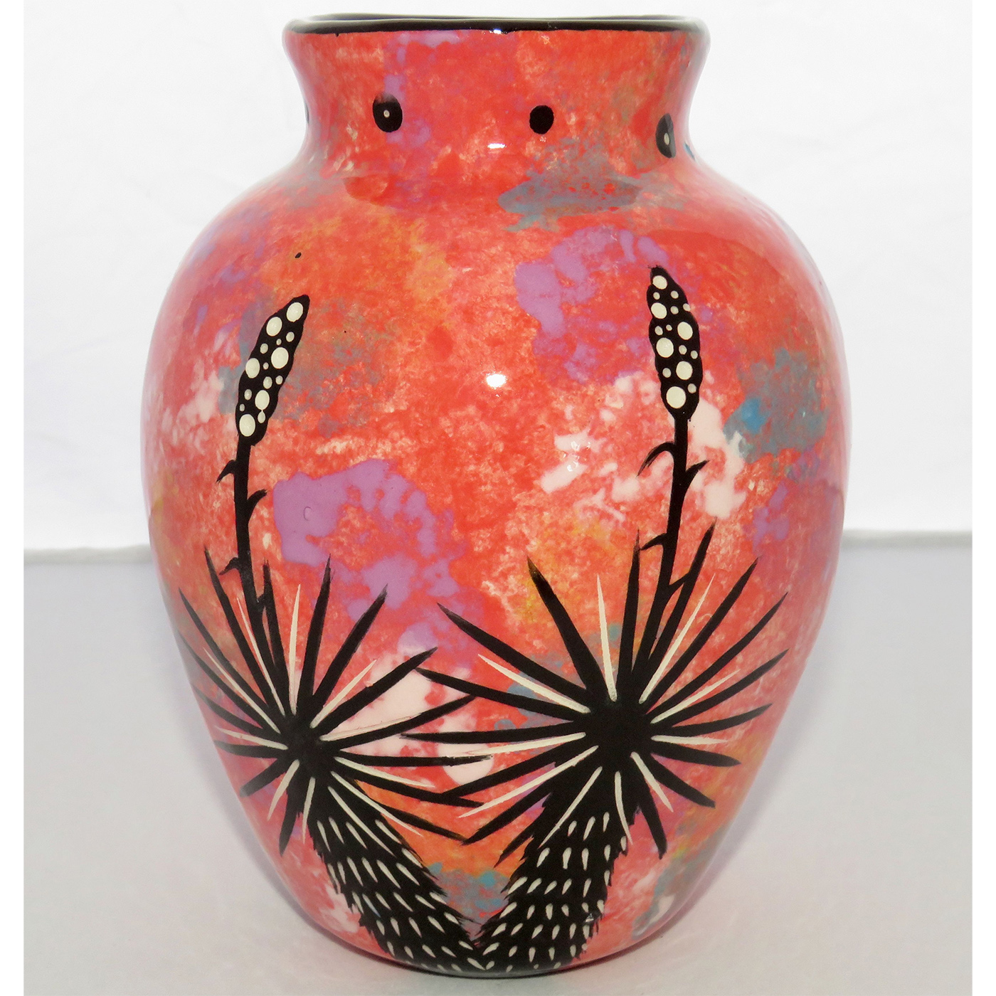 Photo of Mana Pottery Six Inch Vase featuring owl on one side and desert plants on reverse, all on a rose background.