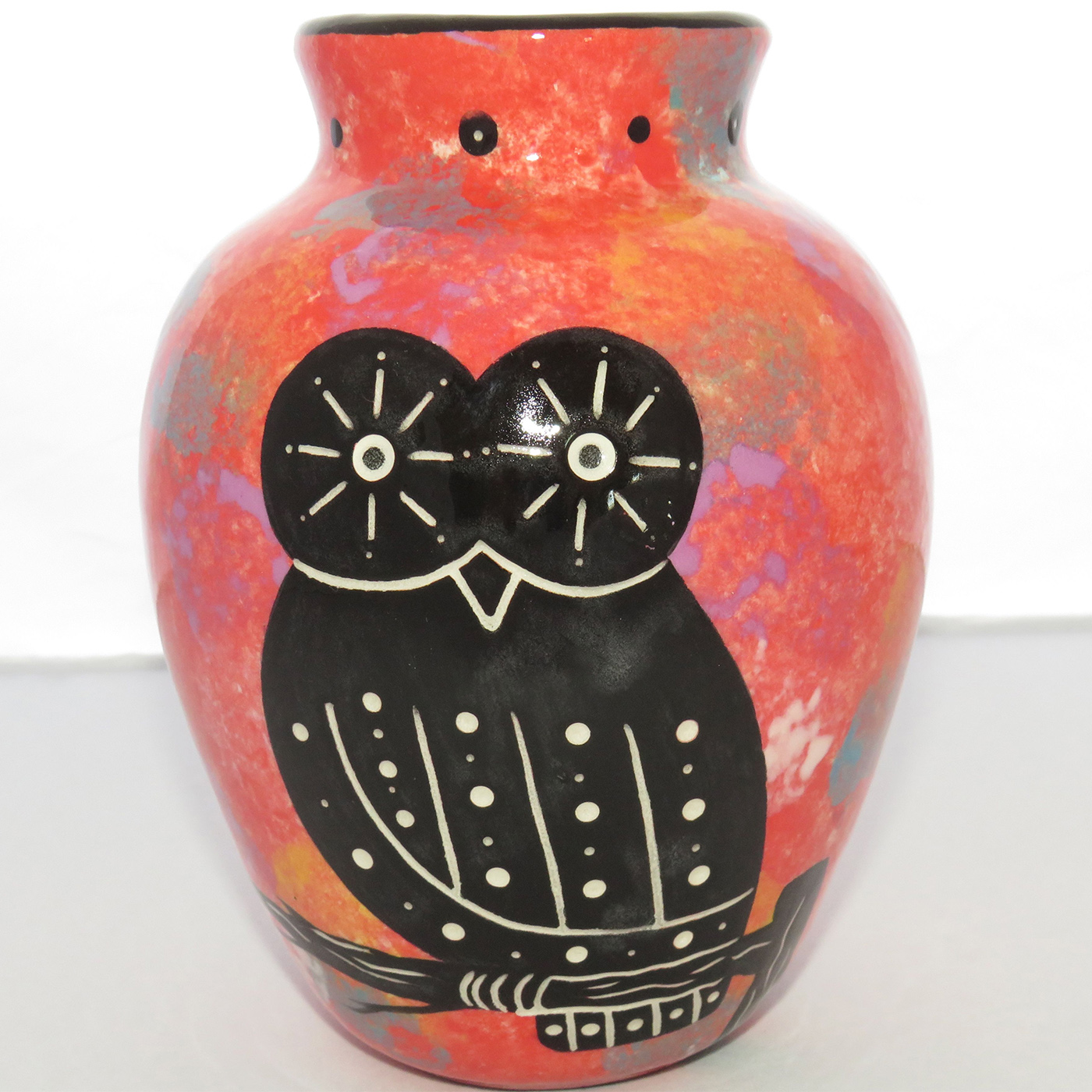 Photo of Mana Pottery Six Inch Vase featuring owl on one side and desert plants on reverse, all on a rose background.