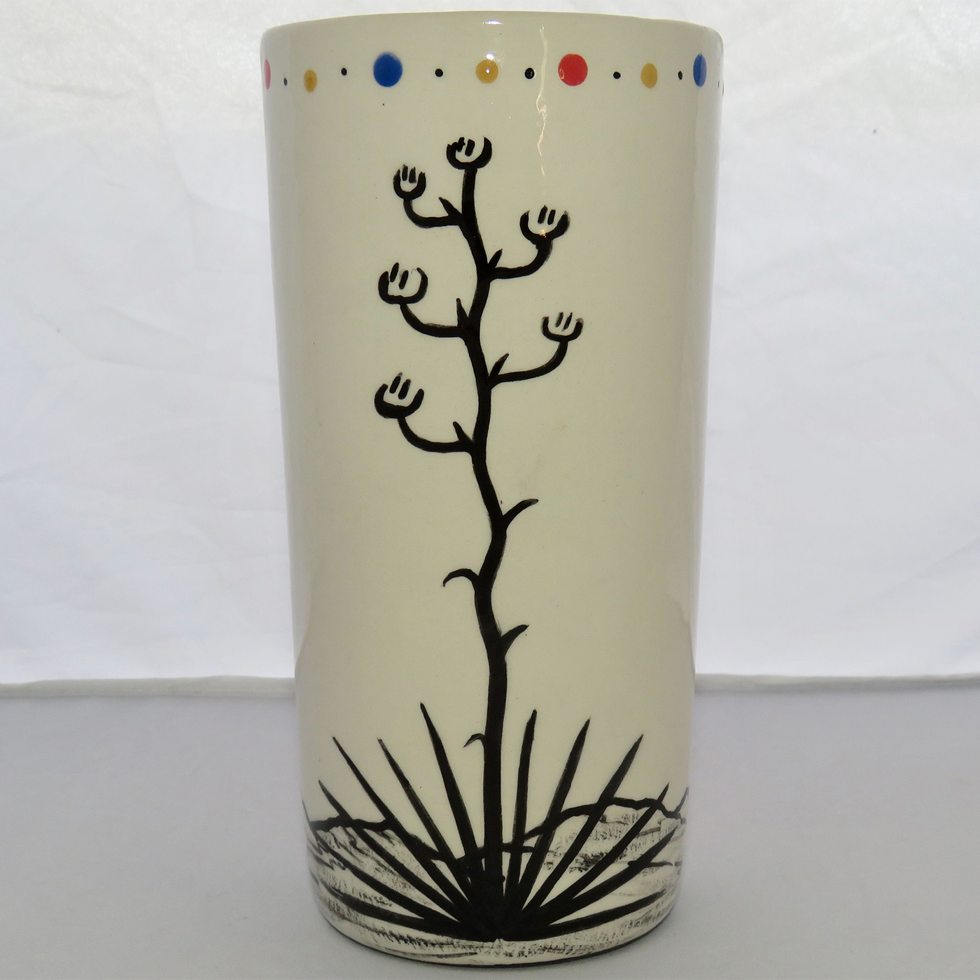 Photo of Mana Pottery Tall Ceramic Tumbler featuring the Mushroom Shaman, with desert on flip side.