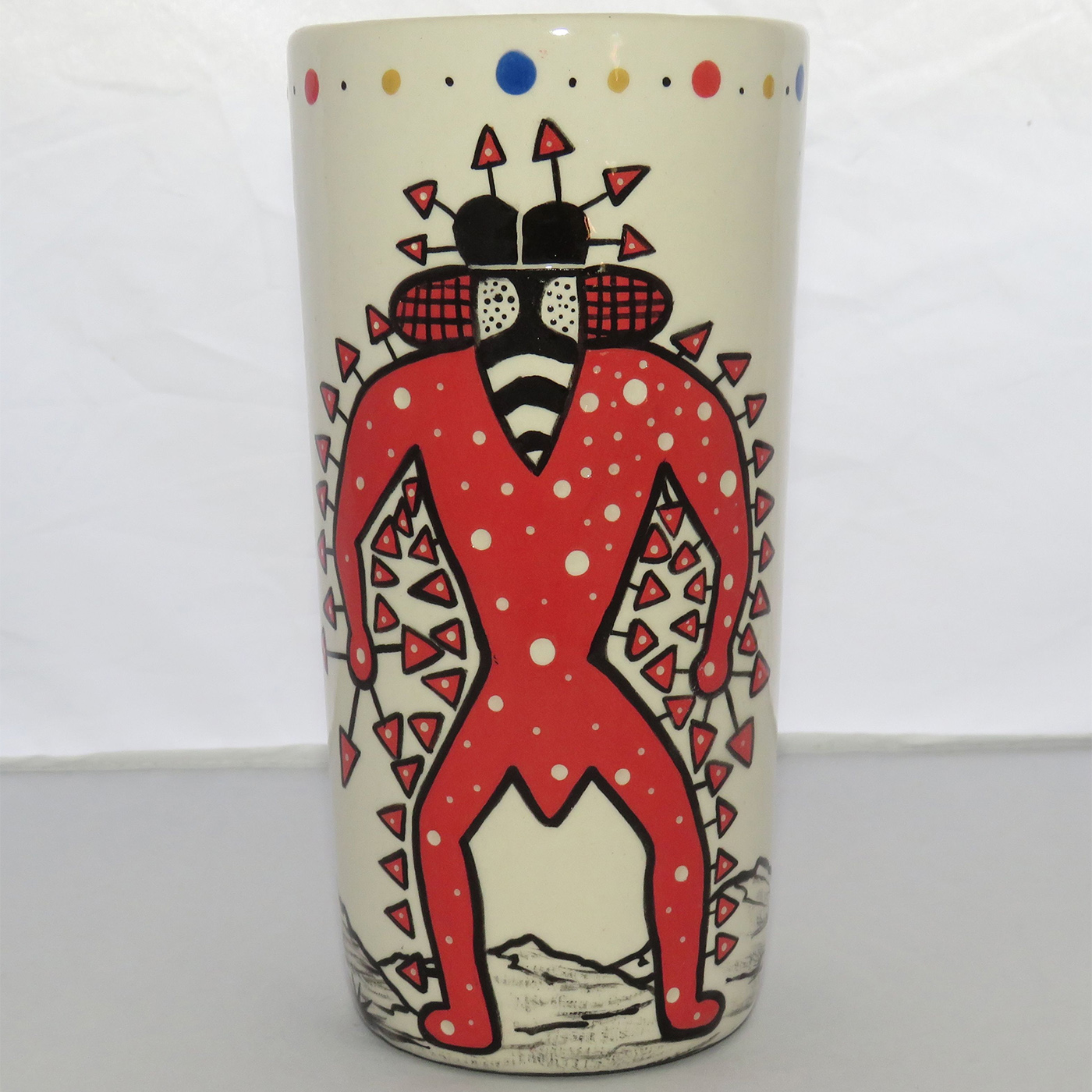 Photo of Mana Pottery Tall Ceramic Tumbler featuring the Mushroom Shaman, with desert on flip side.