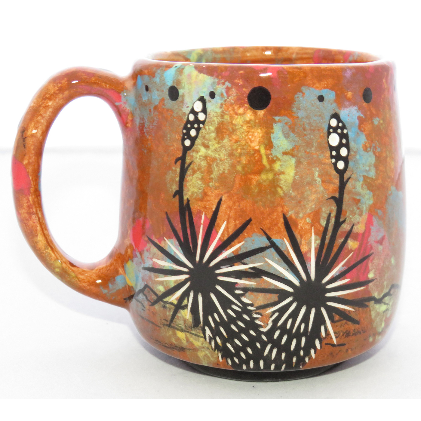 Photo of Mana Pottery Country Cup featuring hawk in flight over desert