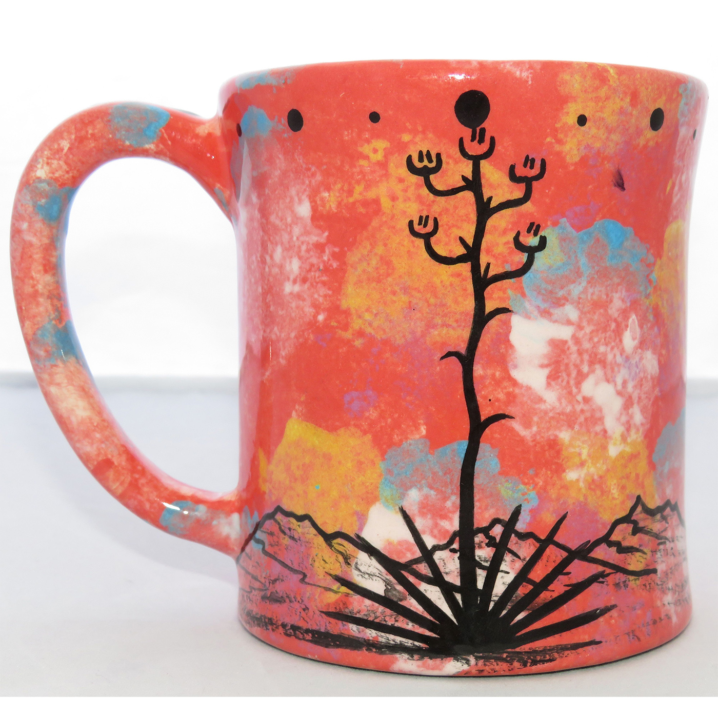 Photo of Mana Pottery E-mug featuring Egyptian cat on one side and desert vegetation on the other on a rose background.