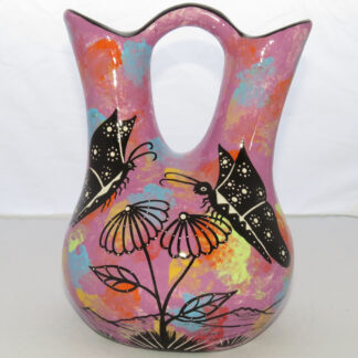 Photo of Mana Pottery medium wedding vase featuring 2 butterflies and desert landscape on light purple background