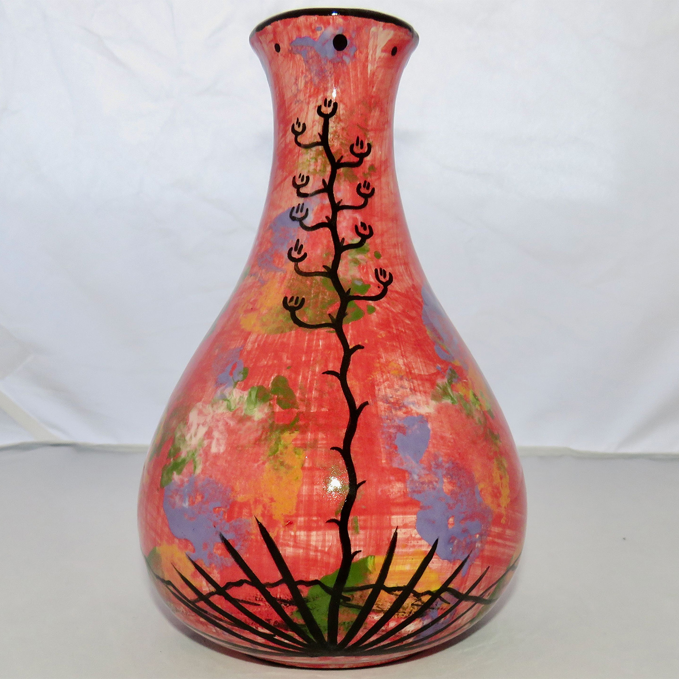 Photo of Mana Pottery Teardrop Vase featuring owl in flight over desert, on mottled rose background. This is the reverse side.