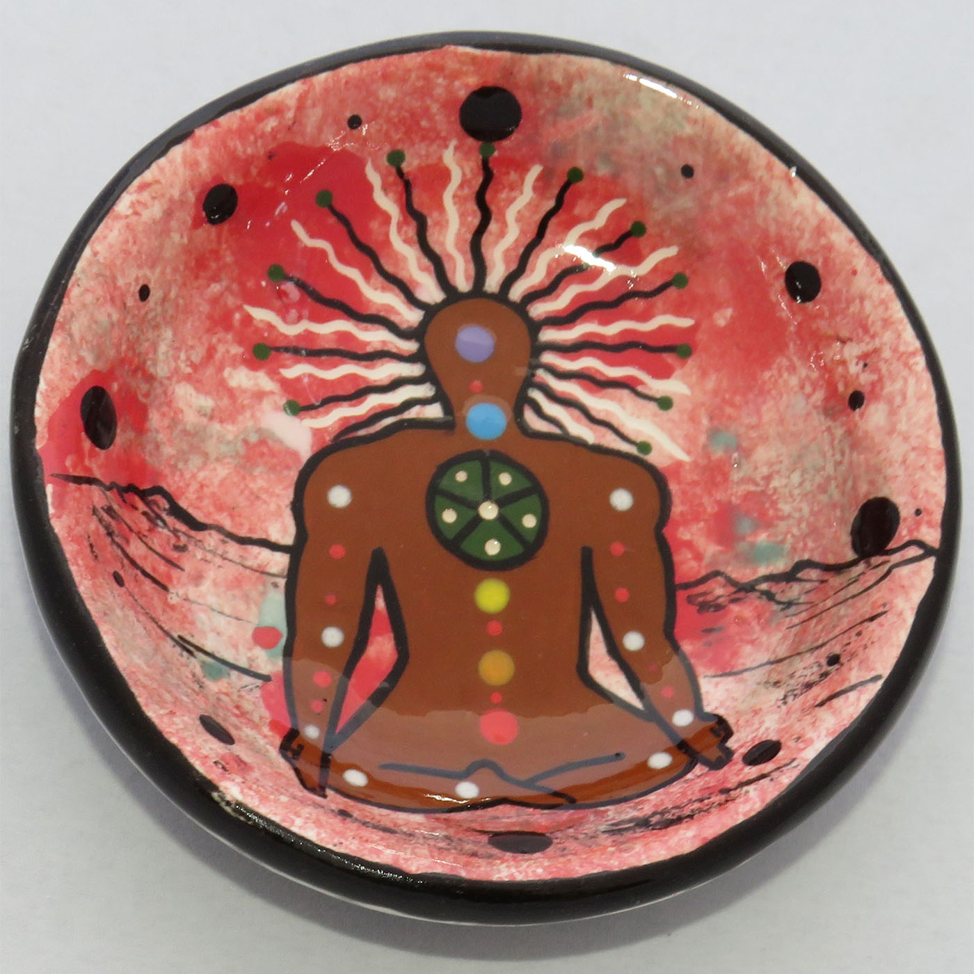 Image of Mana Pottery Holy Bowl featuring the Chakra Being on rose background.