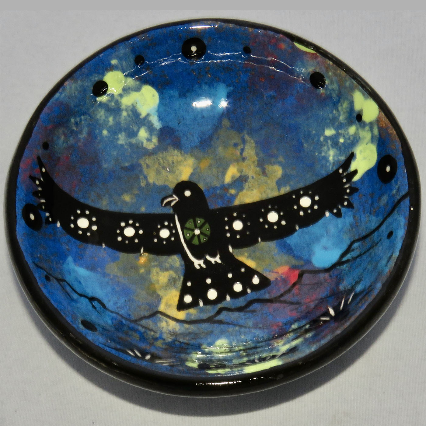 Image of Mana Pottery Holy Bowl featuring hawk in flight, high in a deep blue sky.