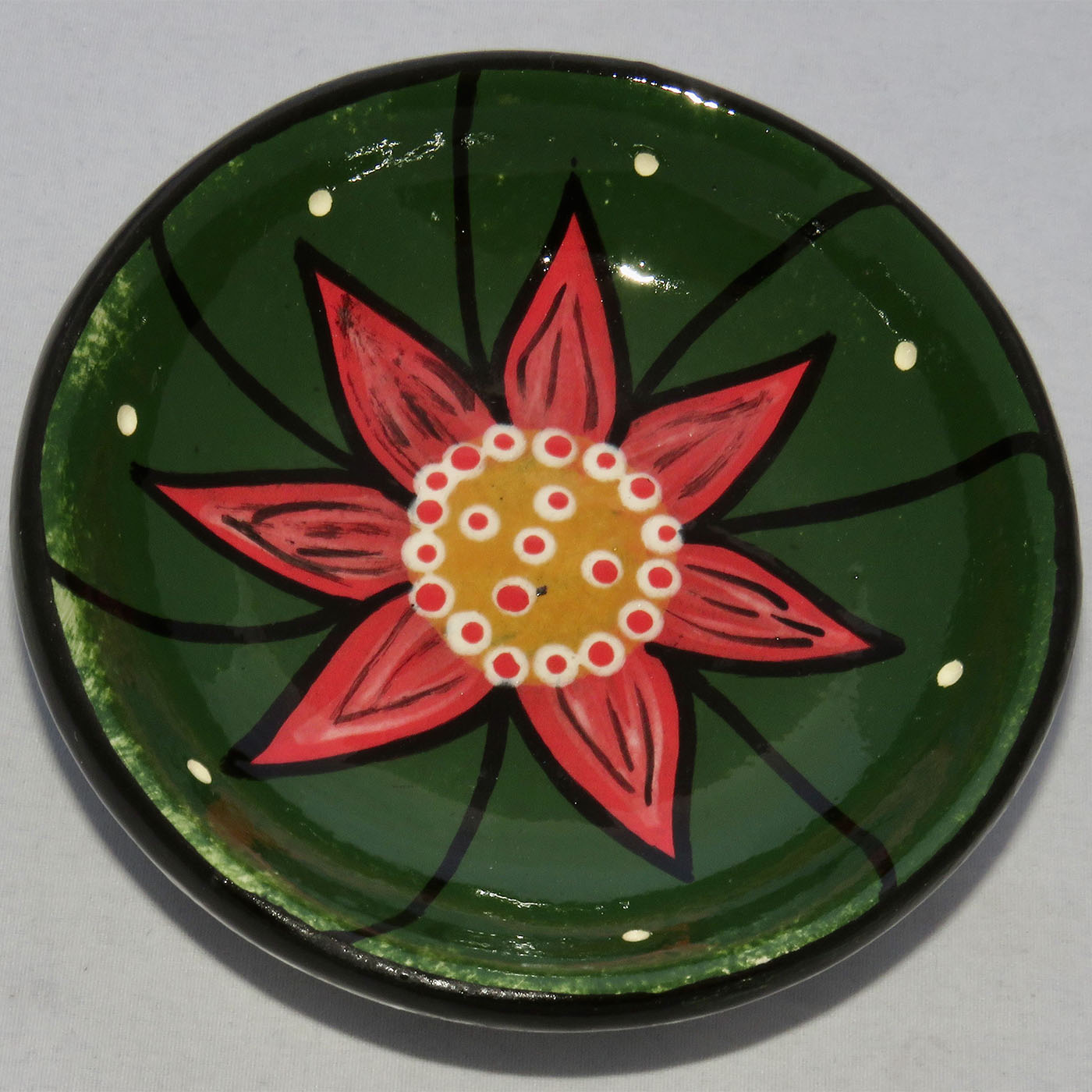 Photo of Mana Pottery Holy Bowl featuring deep green Peyote in rosy star-shaped bloom.