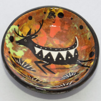 Image of Mana Pottery Holy Bowl featuring deer running in desert, on a chocolate flame background.