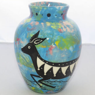 Image of Mana Pottery Six Inch Vase featuring deer running through desert on turquoise blue background.
