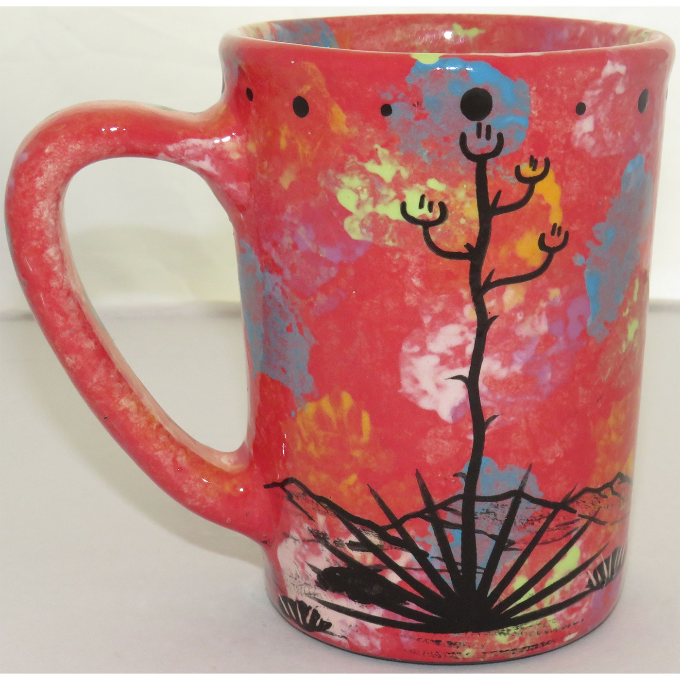 Image showing Mana Pottery Large Mug featuring bat on rose. Reverse shows desertscape. (this is the reverse view)