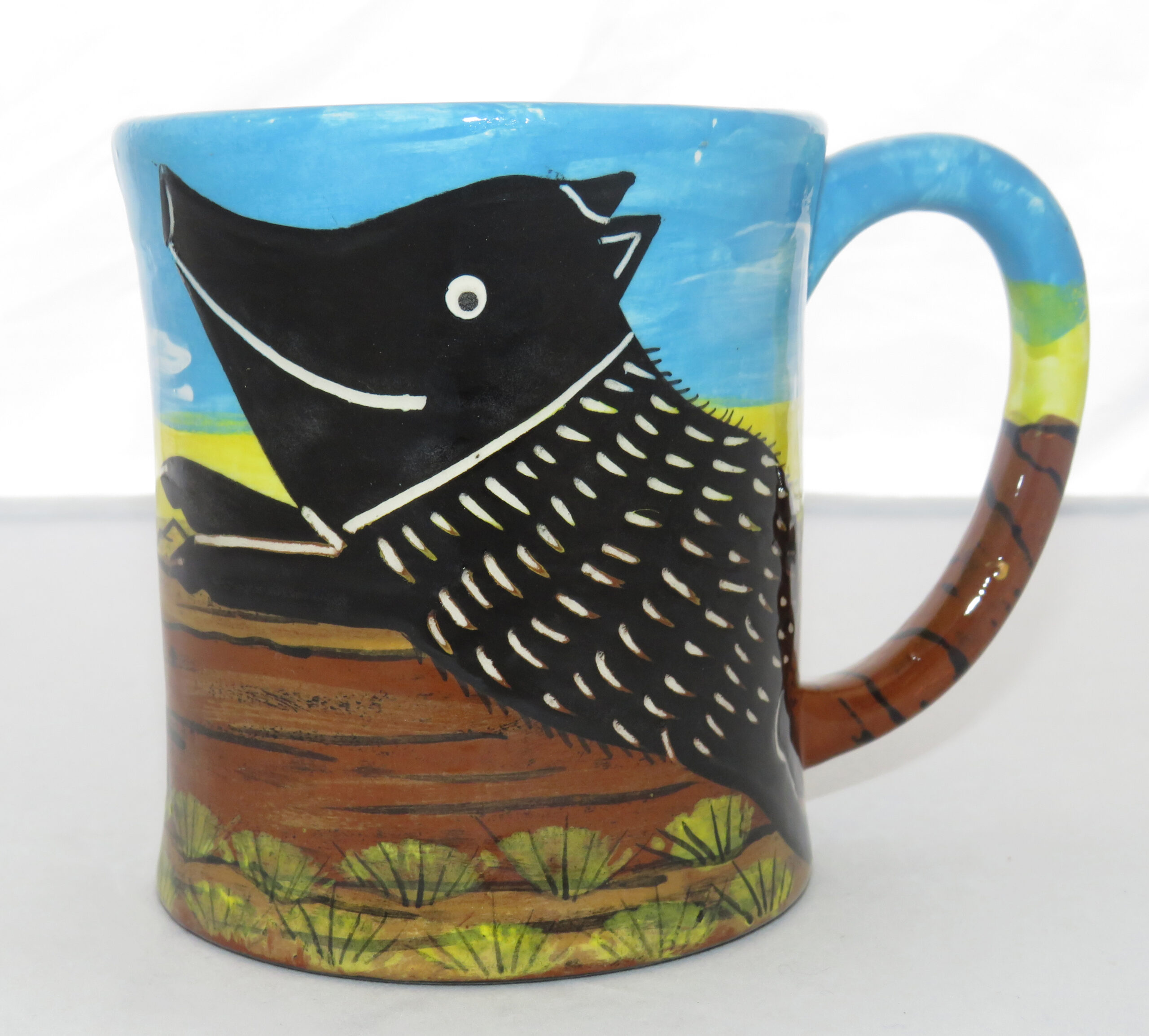 E-Mug with Javelina running in the Desert